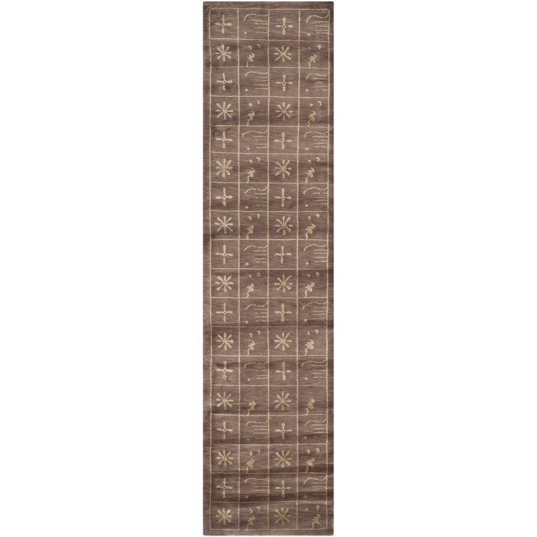 Tibetan Plum Pictogram Brown Area Rug