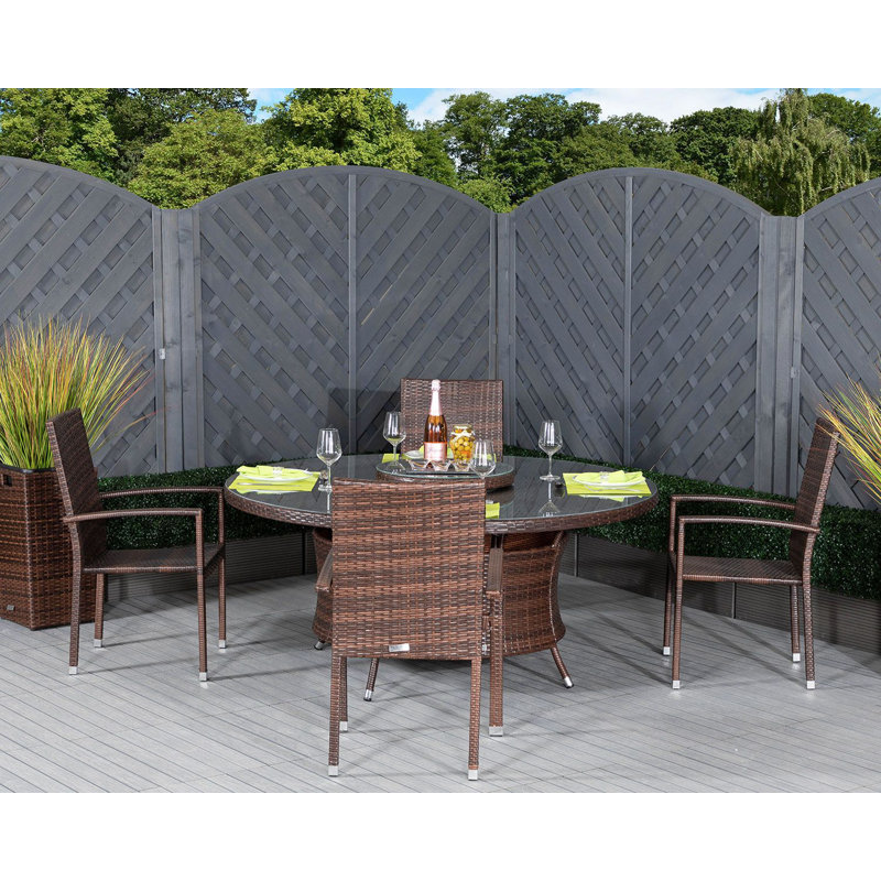 Ervin 4 - Person Patio Dining Set with Round Table , Cushions Included