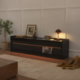 Modern TV Stand With Ample Storage,4 Drawer Design With Tempered Glass ,Built-In Charging Ports And Ambient LED Lighting
