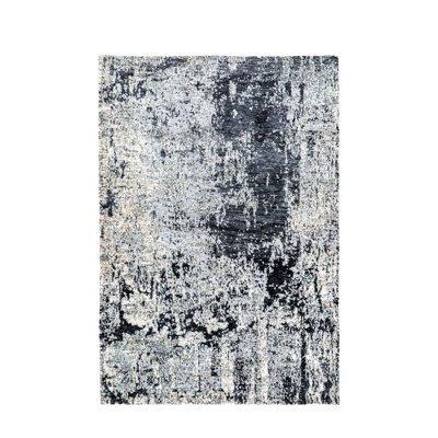 Alezandra Abstract Circular Knotted Area Rug