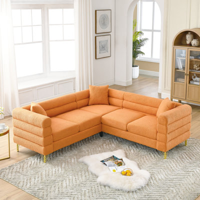 Oversized 81.5-Inch Corner , L-Shaped 5 Sectional. Modern Streamline Style With Smooth Shapes. Strong Solid Wood & Metal Frame. Orange Cloth, Foam Interior. 3 Cushions, 250 Lbs Seat Weight Limit. Us
