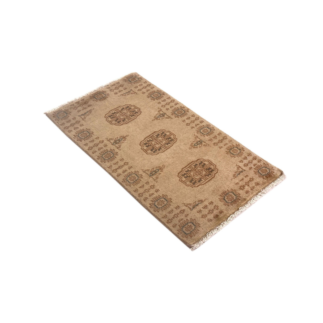 Handgefertigter Teppich Windridge in Beige