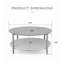 Table basse ronde d'extérieur moderne à deux niveaux, plateau en fer antirouille et étagère en rotin en PE tressé à la main, idéale pour terrasse, jardin et balcon.