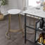 Tabouret de bar moderne en métal sans dossier 28,75 po Hula, siège rond en fer blanc et base dorée avec repose-pieds intégré-841520729