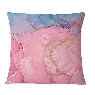 Coussin rose avec impression à l'encre bleue et horizon bleu