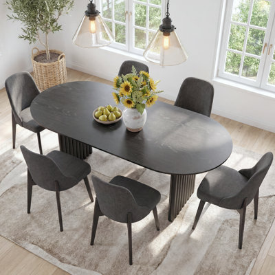 Janik 7 - Piece Oval Solid Wood Dining Table Set