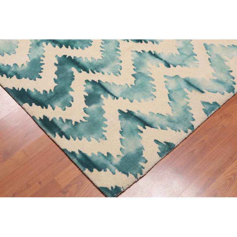 Tapis beige en laine touffeté fait main