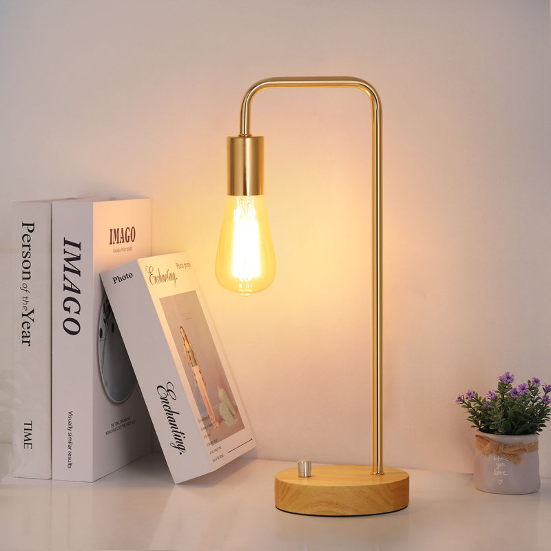 Lampe de table avec cadre doré et base en bois