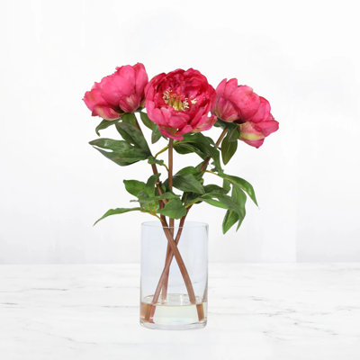 Arrangement floral de pivoines en soie dans un vase