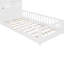 Lit simple blanc avec fenêtre, tiroirs de chevet, douilles et support de rangement simple-446977170