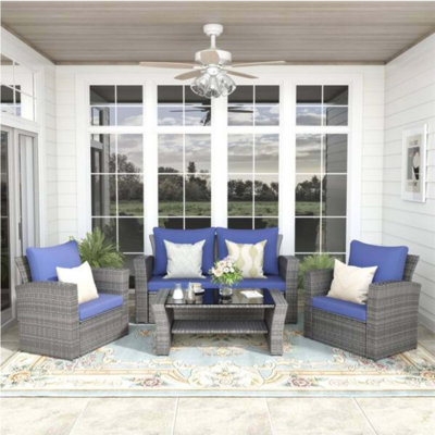 4-Piece All-Weather Wicker Patio Set With Tempered Glass Table And Plush Blue Cushions,  For Modern Outdoor Living