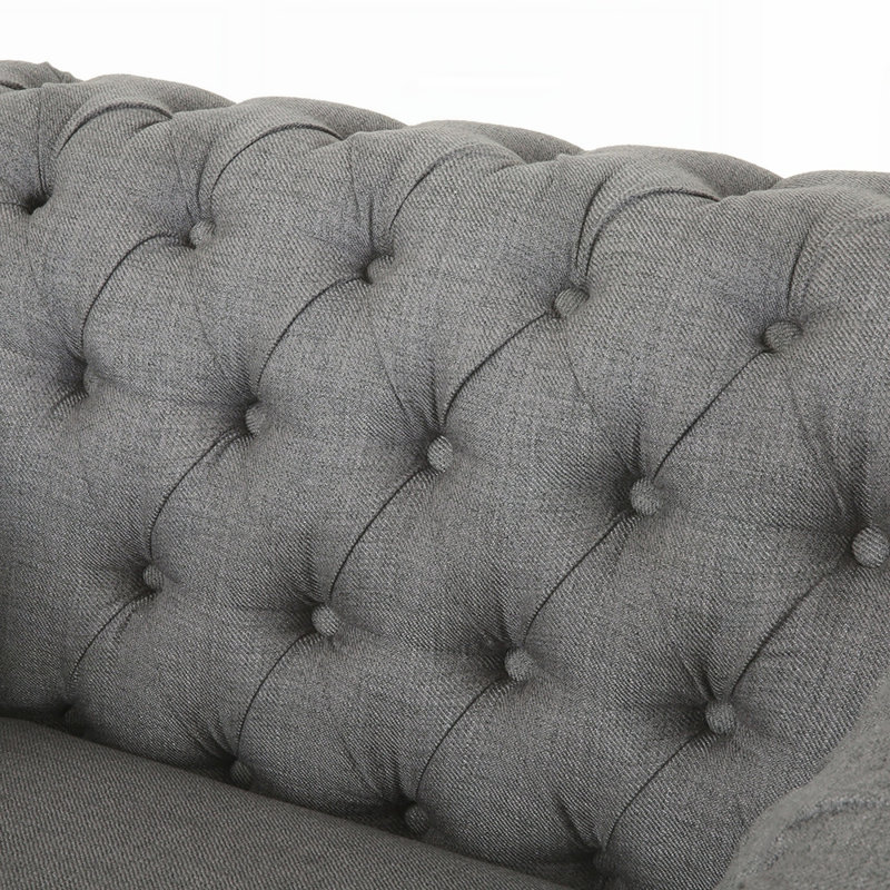 Fauteuil club capitonné