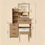 Bureau de meuble-lavabo moderne en noyer avec 3 modes d'éclairage DEL et luminosité réglable, 4 tiroirs et tablettes de rangement ouvertes, support pour sèche-cheveux et prise de courant, fauteuil inclus
