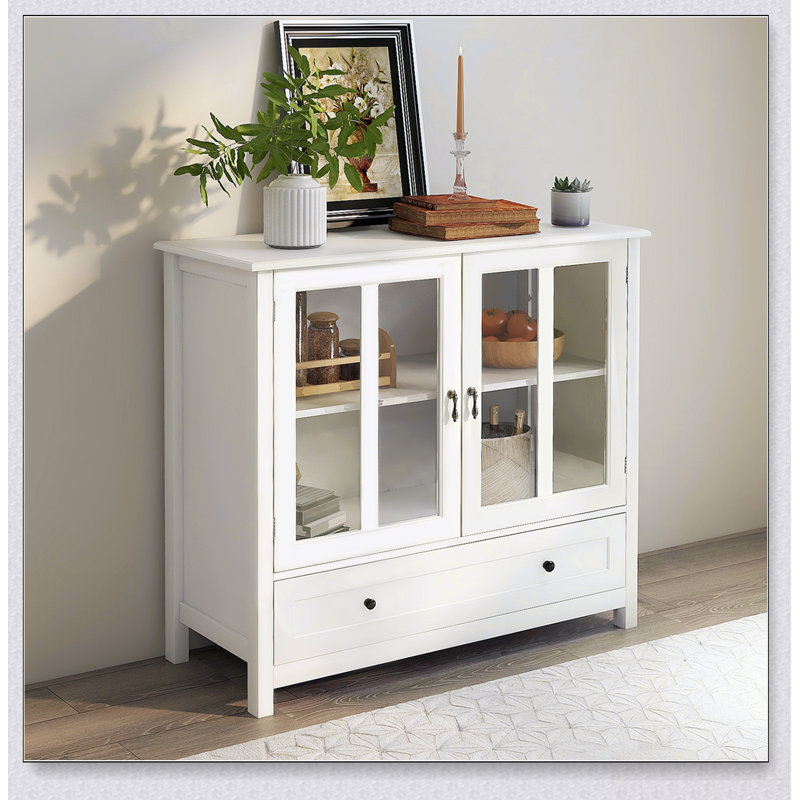 Spacious Buffet Storage Cabinet With Double Glass Doors And Unique Bell Handles For Modern Kitchens