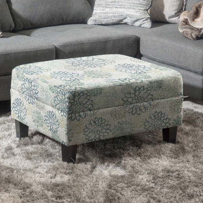Repose-pieds avec rangement relevable