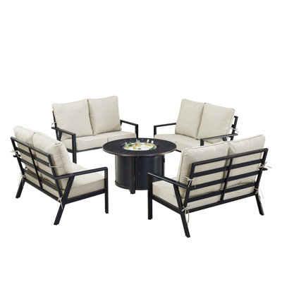Ensemble de table de foyer en aluminium noir avec quatre causeuses profondes