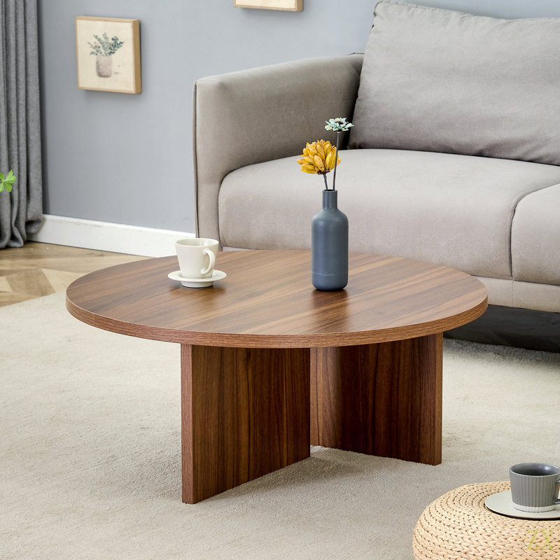 Table basse ronde polyvalente en panneau de fibres à densité moyenne pour divers styles d'intérieur, alliant le minimalisme moderne à l'élégance nordique, avec des dimensions de 31,5 po x 31,5 po x 13,98 po.