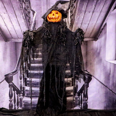 Witches and Wizards Haunted Hill Farm 6 ft. Life-Size Scary Poseable Pumpkin Witch, Halloween Prop with Lights and Sound