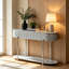 Console ovale grise allongée, de style minimaliste moderne, avec tiroirs de rangement