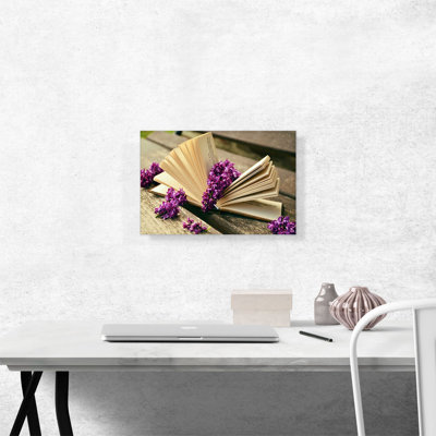 Livre avec fleurs - reproduction de photo sur toile tendue