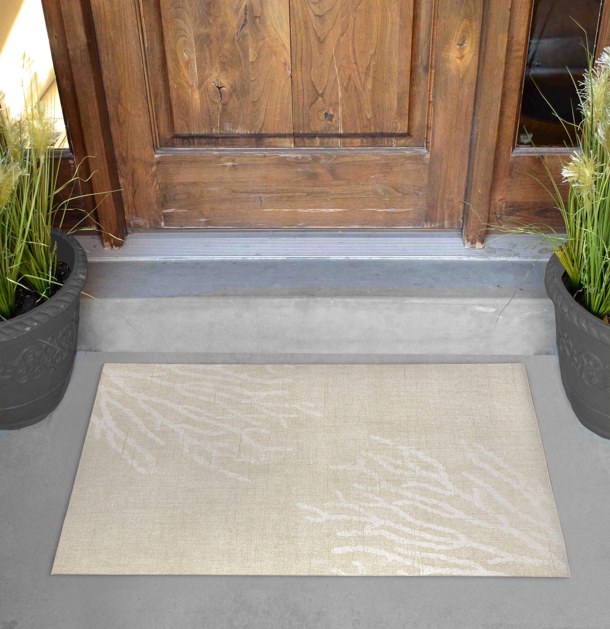 https://assets.wfcdn.com/im/54285775/compr-r85/1535/153583374/sultana-non-slip-geometric-outdoor-doormat.jpg