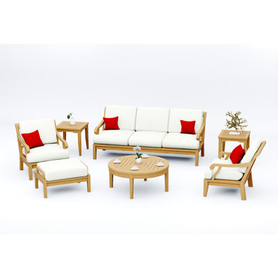 Ensemble de canapé en bois de teck 7 pièces Teakstation: canapé, 2 chaises longues, repose-pieds, table basse ronde et 2 tables d'appoint avec coussins en tissu extérieur Sunbrella # 5404 toile naturelle