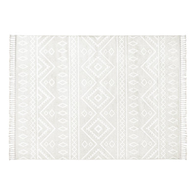 Tapis gris en polyester tissé à la machine Casuarina