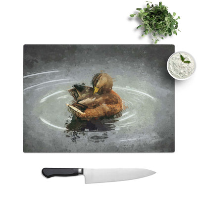 Glass Duck Preening Its Feathers in Abstract Chopping Board