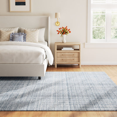 Tapis bleu / ivoire en laine Harris
