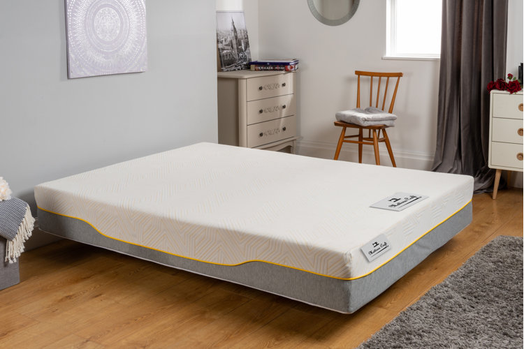 large white memory foam mattress in a beautiful bedroom