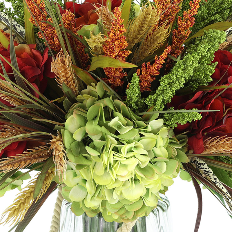 Heather and Assorted Hydrangeas in Glass Vase