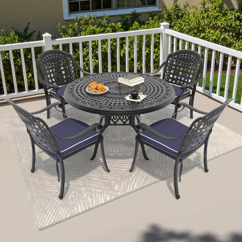 Selmner 47.24 -inch Round Table Cast Aluminum Outdoor Dining Set with Umbrella Hole and Blue Cushions