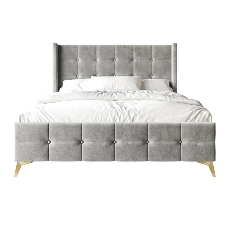 Karmane Upholstered Wingback Bed