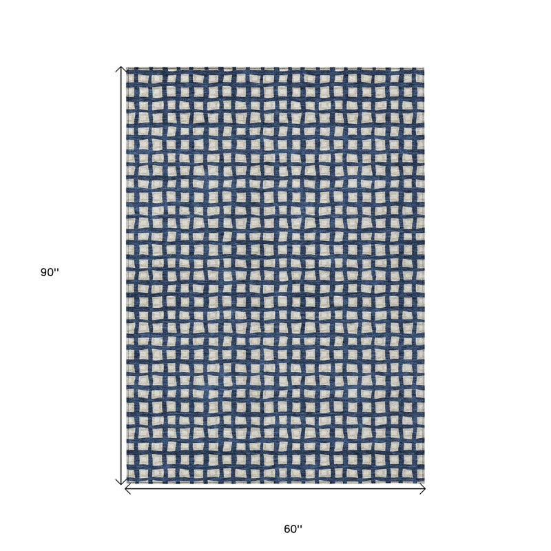 Tapis extérieur lavable géométrique bleu marine et ivoire 5 pi x 8 pi
