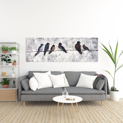 Oiseaux colorés sur des branches