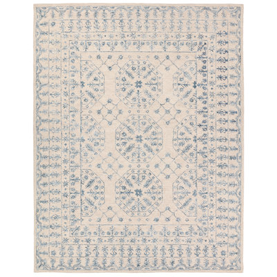 Tapis ivoire / bleu Bungalow Rose Andjela