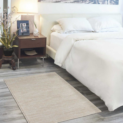 Mullican Sandy Solid Ivory/Beige Easy Care Indoor/Outdoor Area Rug