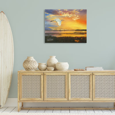 Bird over Sunlit Pond Canvas Wall Art by D. Rust