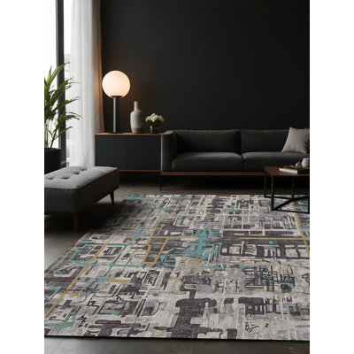 Tapis gris soyeux et moelleux