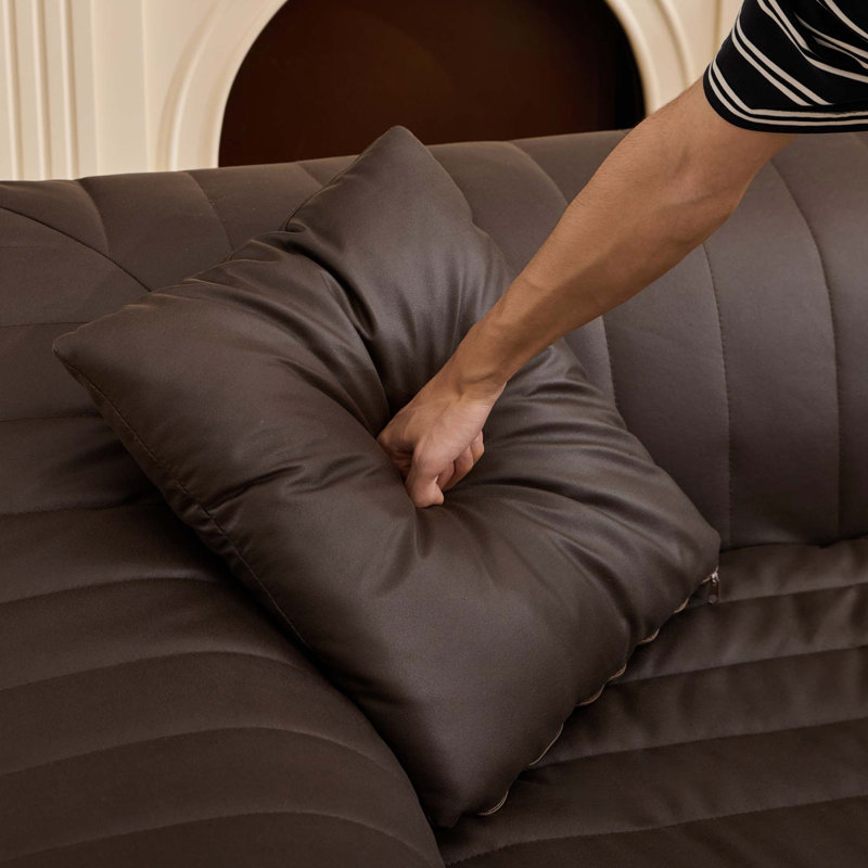 Causeuse spacieuse en similicuir à assise profonde avec design peu encombrant