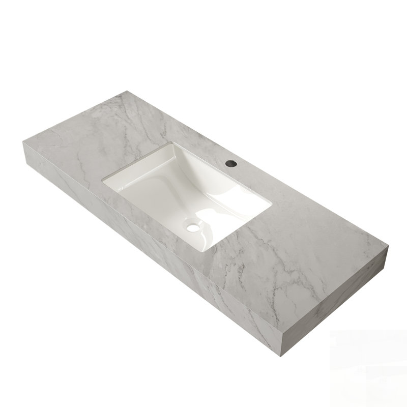 Plan de travail en pierre frittée veinée avec lavabo en céramique encastrée, alliant haute durabilité et esthétique moderne pour les meubles-lavabos de salle de bain contemporains.