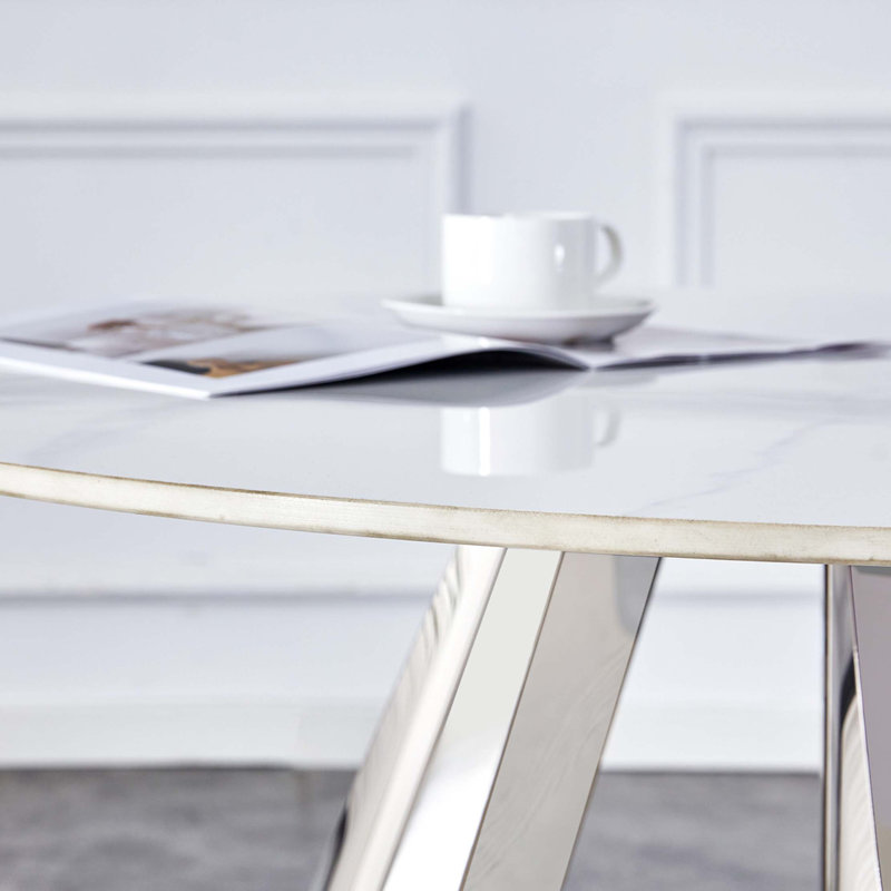 Table en pierre frittée avec pieds en acier