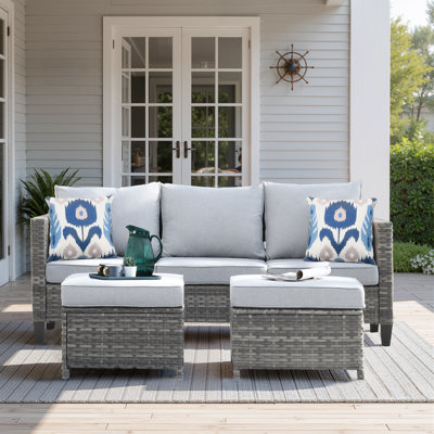 Harbin 76.77" Wide Outdoor Wicker Patio Sofa with Cushions