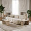 Ensemble de 2 tables basses modulaires de style travertin avec emboîtement en forme de L, séparables pour une utilisation flexible de l'espace et un style sans effort.