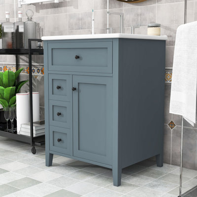 Meuble-lavabo de 24 po avec lavabo en céramique, tablettes réglables et 4 tiroirs