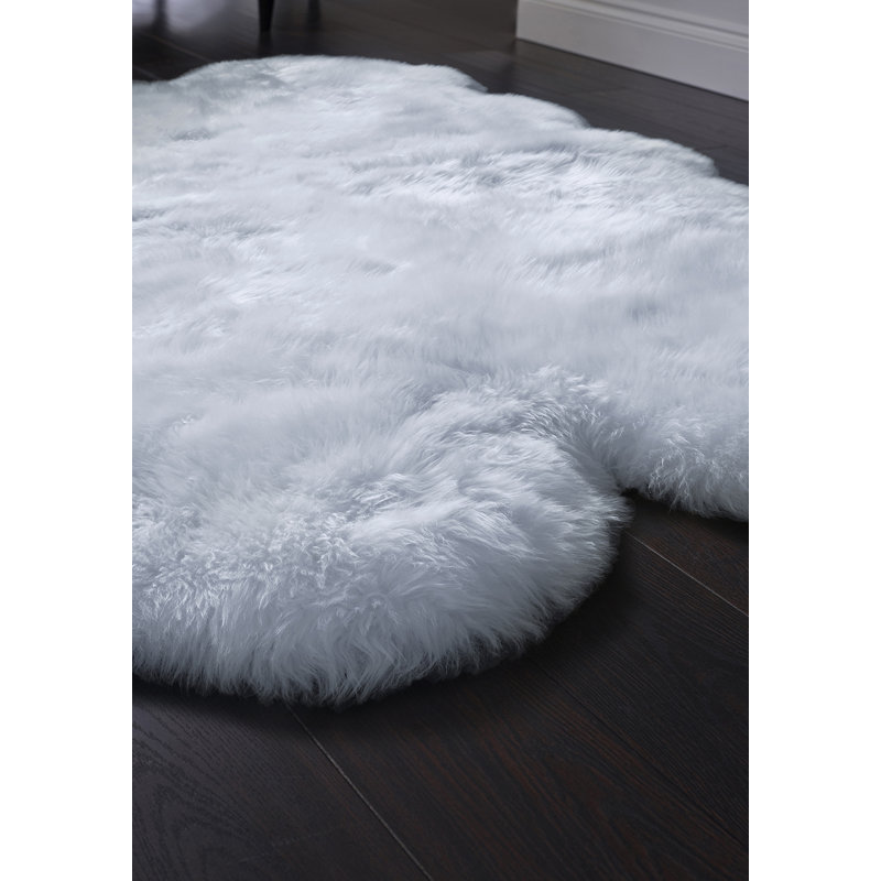 Celestia Solid Colour Quad Duck Egg Blue Sheepskin 105cm X 160cm Rug