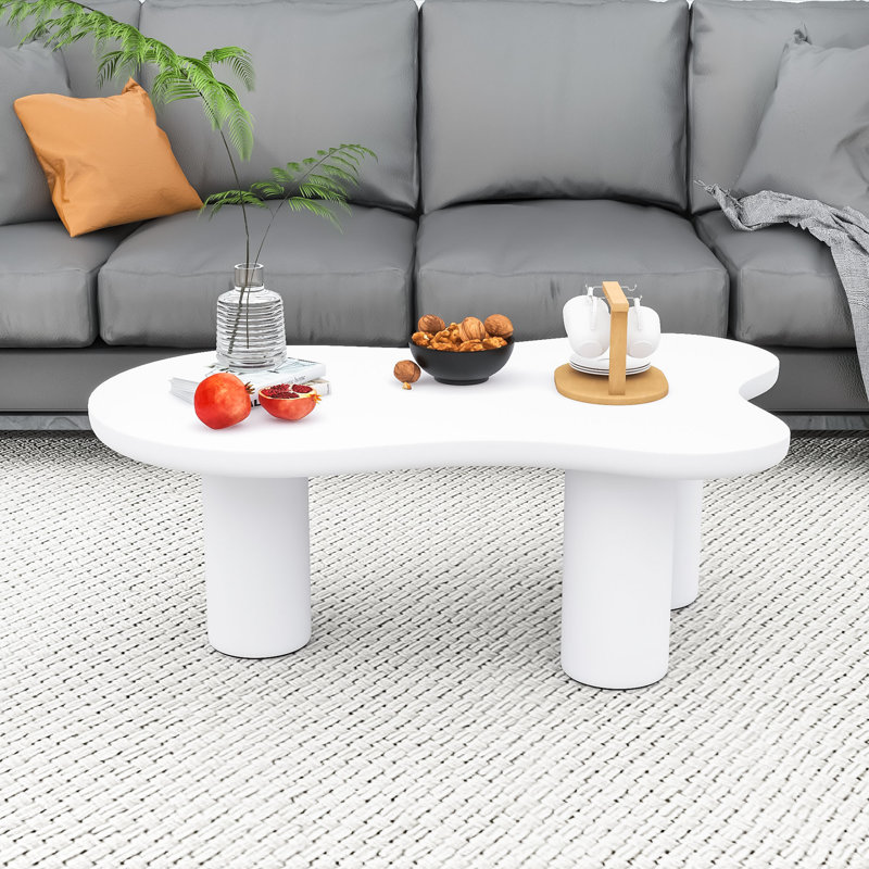 Table basse moderne en forme de nuage avec bords arrondis et pieds cylindriques, Blanc