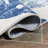 Etolin Tropical Leaf High-Low Light Gray/Navy Indoor/Outdoor Rug-69807600