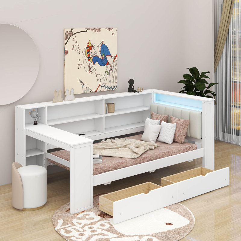 Lit plateforme simple en bois avec tablettes de rangement, tiroirs, station de charge, DEL, bureau et tête de lit tapissier