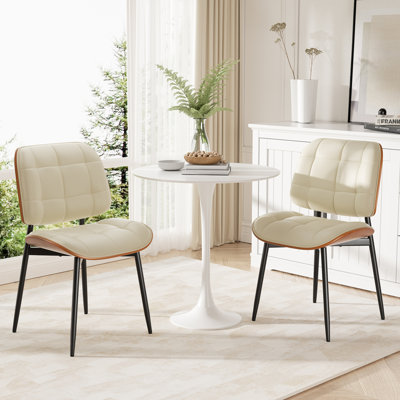 PU Leather Upholstered Dining Chairs With Stitched Detailing And Soft Padding - Perfect Side Chairs For Dining Rooms, Kitchens, And Living Rooms. by Corrigan Studio